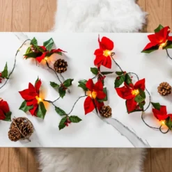 Pre Lit Velvet Silk Poinsettia Garland With Red Berries 6ft -Holiday Discount Store Pre Lit Velvet Silk Poinsettia Garland with Red Berries 6ft 5 result 600x600 1